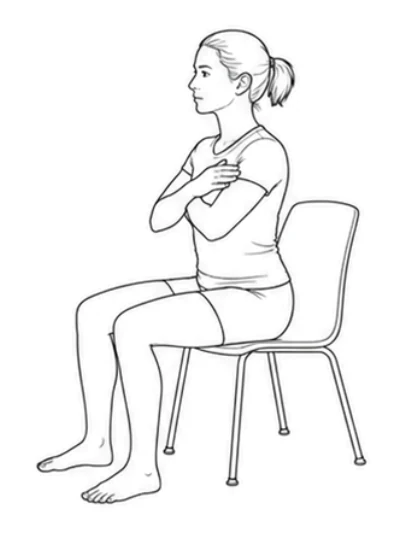 Sit-to-stand – Sit near the front of the chair. Keep your feet hip-width apart on the floor and knees over your feet. Keep your back straight, look forward, and cross your arms over your chest.