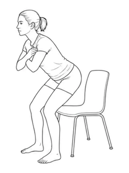 Sit-to-stand – Lean your upper body forward until your shoulders are over your feet. Lift clearly away from the chair seat. Keep your feet down and arms crossed.